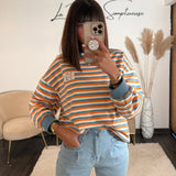 PULL RAYE ORANGE ET BLEU JOY - La Petite Somptueuse